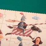puzzle I´m a knight 100 piezas con ilustraciones en un tono de humos en un castillo medieval de la marca Londji
