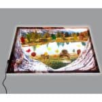 Vinilo A2 para minimundos temática lago sobre mesa de luz