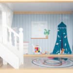 Detalle de la habitación de juegos de la Casa de muñecas de madera con muebles Villa en la ciudad