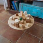 Tabla de equilibrio y piezas de madera El péndulo de Grapat