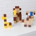 imagen de diferentes construcciones hechas con los bloques meli cube