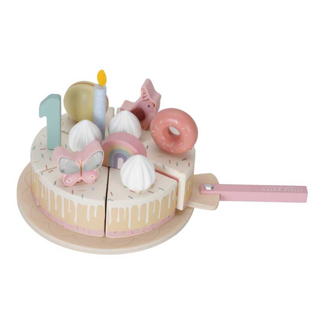 Tarta pastel de cumpleaños Little Dutch Foto de la Tarta pastel de cumpleaños Little Dutch con la espátula sacando una porción