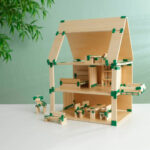 imagen de una casita construida con el Join Clips para Kapla Set de ruedas y clips giratorios