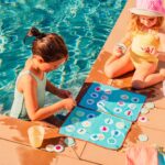 imagen de un grupo de niños jugando a el Juego de playa 2 en 1 Bingo y Memo Loto de Quut